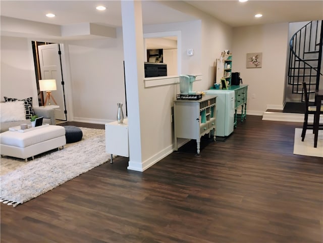 living room featuring dark hardwood / wood-style flooring