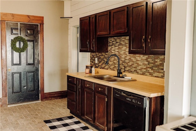 kitchen with dishwasher, a sink, tasteful backsplash, light countertops, and dark brown cabinets