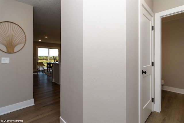 hall featuring dark hardwood / wood-style flooring