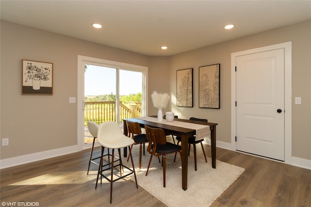 dining room featuring dark wood-type flooring