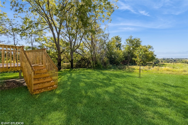 view of yard featuring a deck