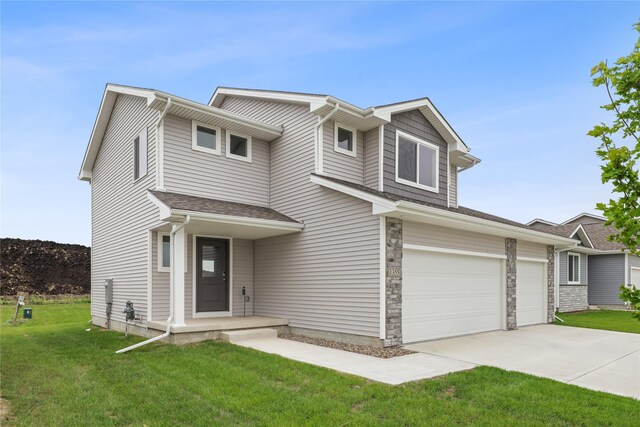 1355 Locust St, Waukee, IA 50263 - view of front facade with concrete driveway, a front lawn, and a garage