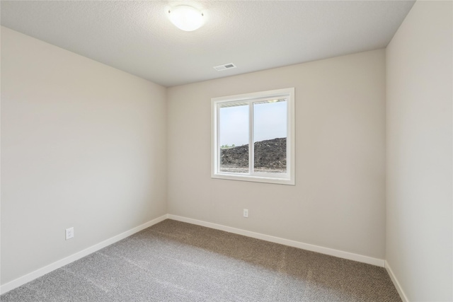 1355 Locust St, Waukee, IA 50263 - carpeted spare room featuring baseboards