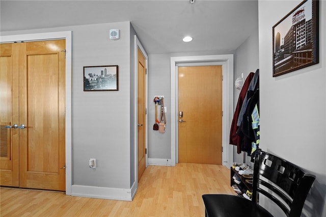 hallway featuring light hardwood / wood-style flooring