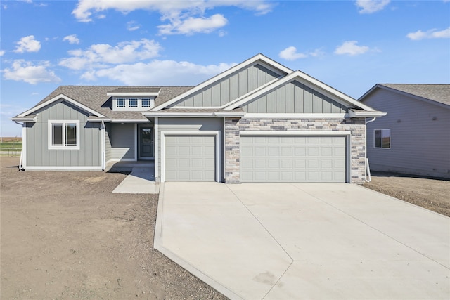 craftsman house with a garage