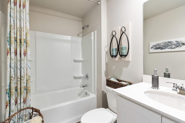 full bathroom with shower / bath combo, vanity, and toilet