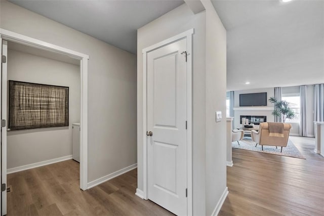 corridor featuring hardwood / wood-style flooring