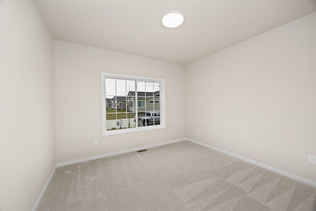 9020 Mockingbird Dr, West Des Moines, IA 50266 - carpeted empty room with baseboards