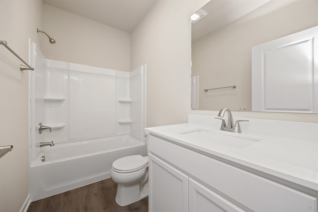 full bathroom featuring toilet, vanity, shower / bath combination, and hardwood / wood-style flooring