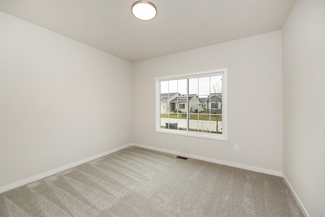 9042 Mockingbird Dr, West Des Moines, IA 50266 - unfurnished room featuring carpet and baseboards