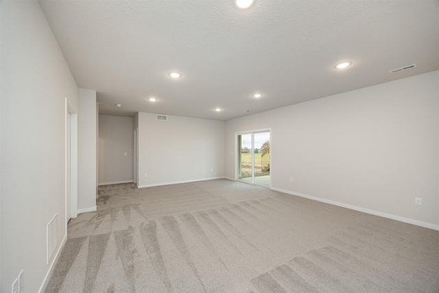 9042 Mockingbird Dr, West Des Moines, IA 50266 - unfurnished room with recessed lighting, light colored carpet, and baseboards