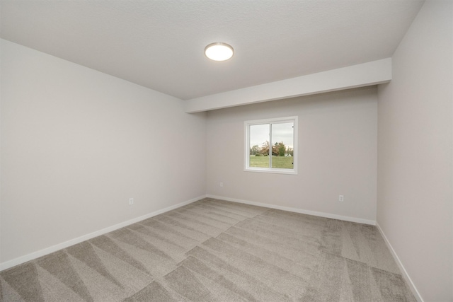 9042 Mockingbird Dr, West Des Moines, IA 50266 - empty room featuring light carpet and baseboards