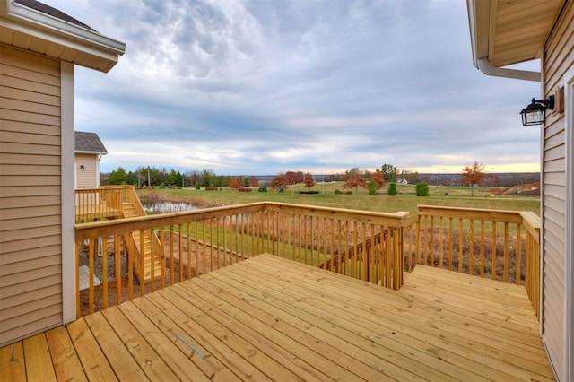 9042 Mockingbird Dr, West Des Moines, IA 50266 - wooden deck with a water view and a view of countryside