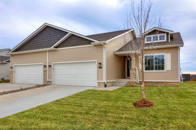 view of front of property with cooling unit, a front yard, and a garage