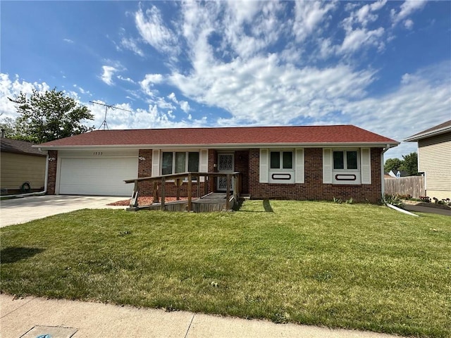 single story home with a garage and a front yard