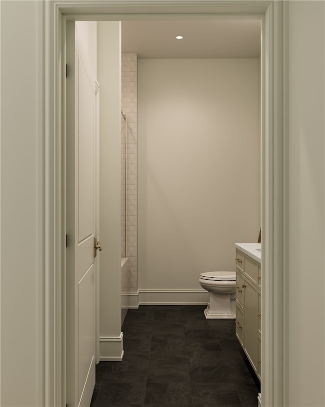 full bathroom with shower / tub combination, vanity, toilet, and tile floors