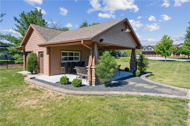 exterior space featuring a yard and a patio