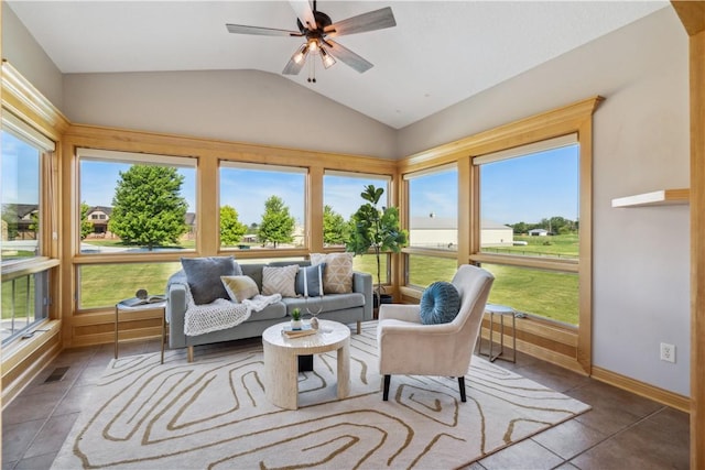 sunroom / solarium featuring ceiling fan and lofted ceiling