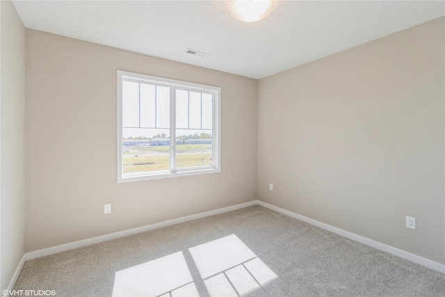 view of carpeted spare room