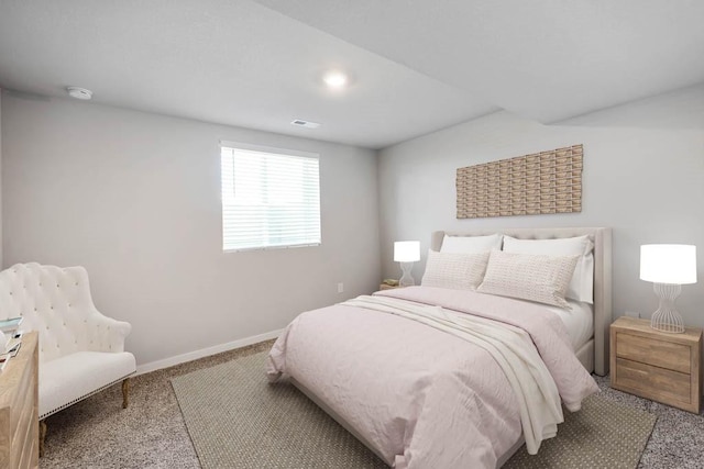 bedroom with carpet flooring, visible vents, and baseboards