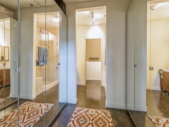 bathroom featuring concrete floors