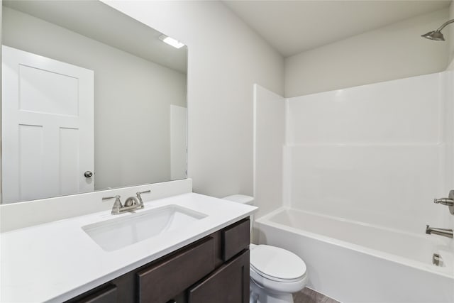 full bathroom with shower / bathing tub combination, vanity, and toilet