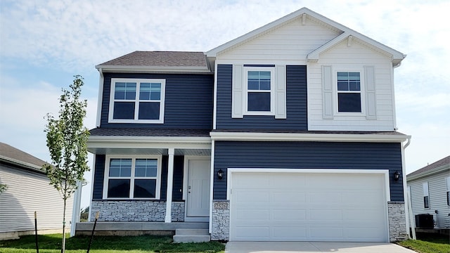 view of front facade featuring a garage and a porch