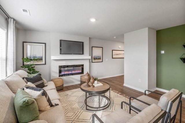 living room with hardwood / wood-style flooring