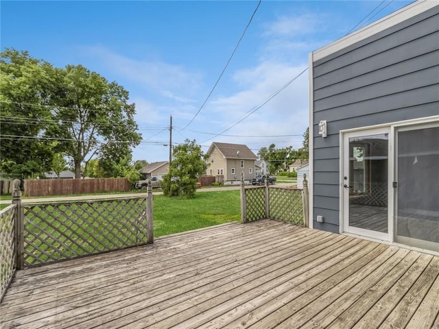 wooden deck with a yard