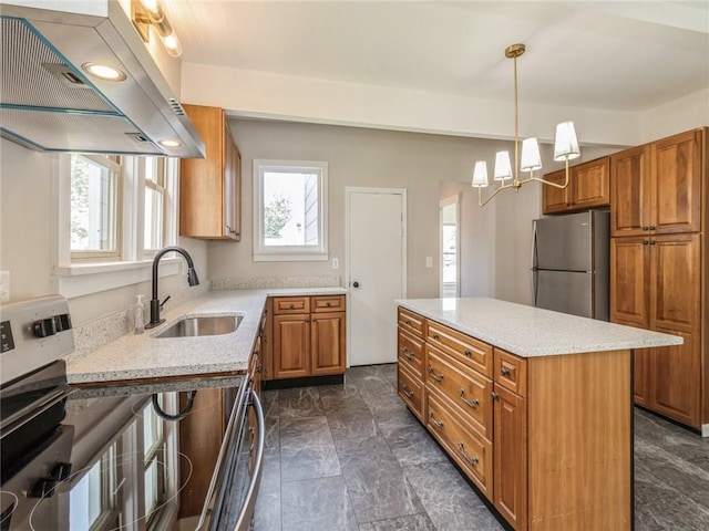 kitchen featuring sink, a center island, ventilation hood, decorative light fixtures, and appliances with stainless steel finishes