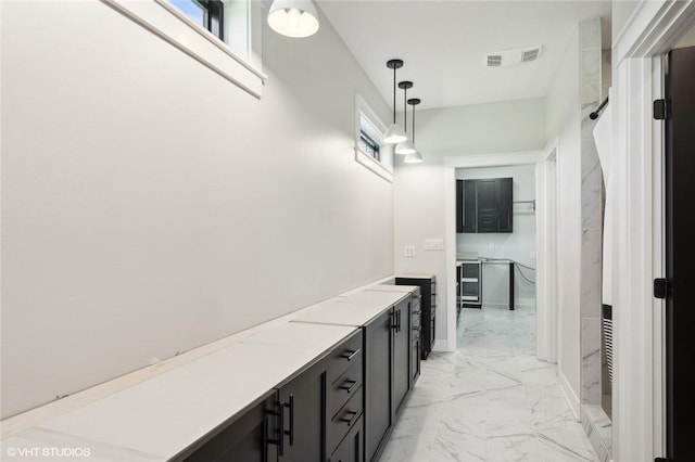 bathroom featuring tile flooring and vanity