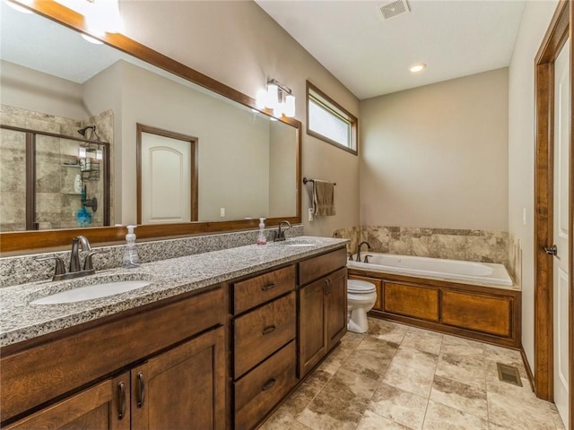 full bathroom with independent shower and bath, vanity, and toilet