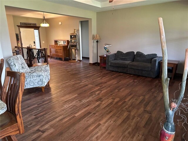 living room with dark wood-type flooring