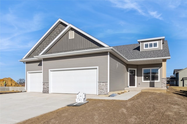 craftsman-style house featuring a garage