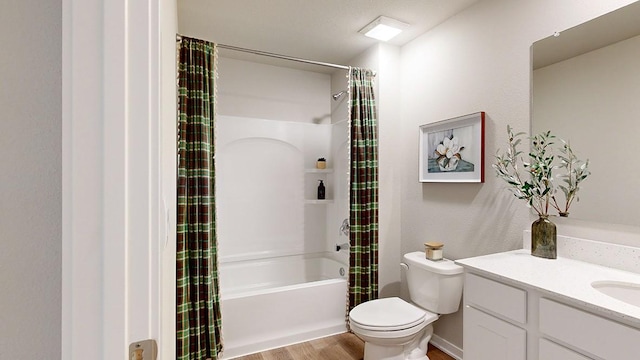 full bath featuring toilet, wood finished floors, vanity, and shower / bath combination with curtain