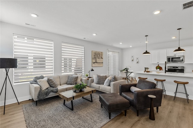 living room featuring light hardwood / wood-style flooring