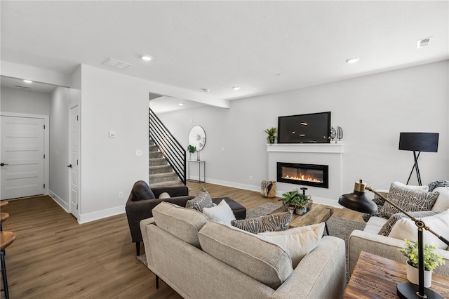 living room with hardwood / wood-style flooring