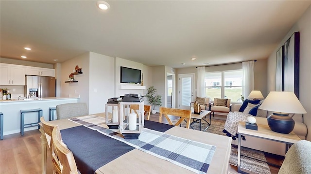 dining room featuring light wood-type flooring