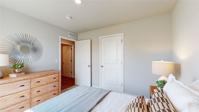 bedroom featuring hardwood / wood-style floors