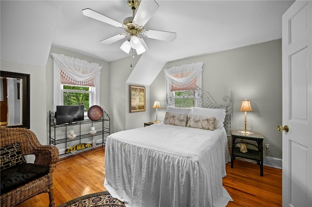 bedroom featuring a ceiling fan and wood-type flooring