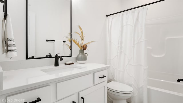 bathroom with toilet, shower / tub combo, and vanity