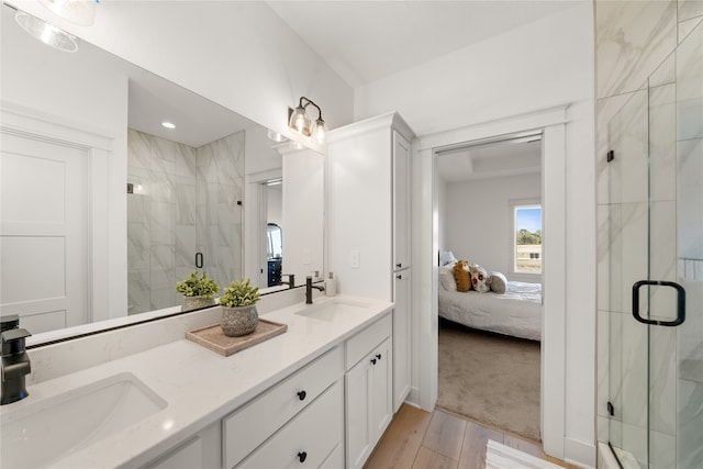 bathroom with vanity and walk in shower