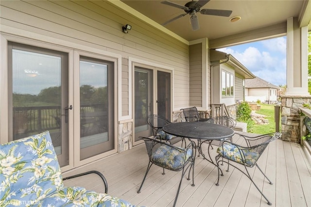 wooden terrace with ceiling fan