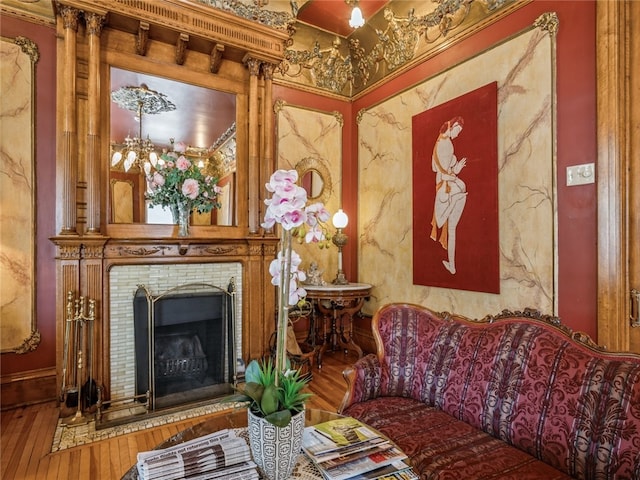 living room featuring hardwood / wood-style flooring and crown molding