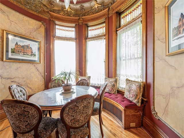 dining room with light hardwood / wood-style floors