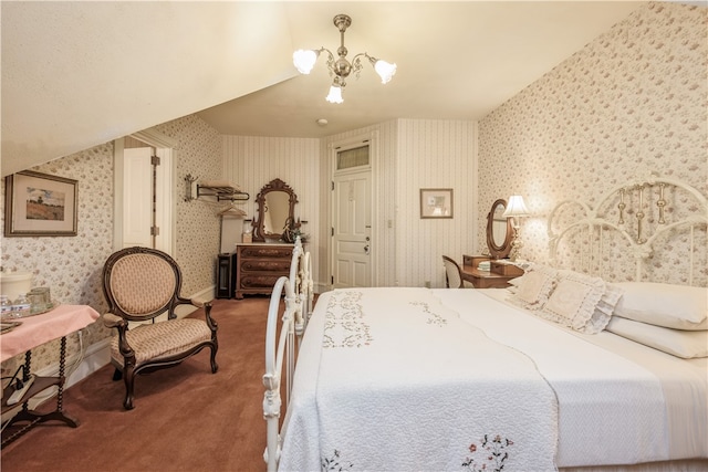 bedroom featuring carpet floors and an inviting chandelier