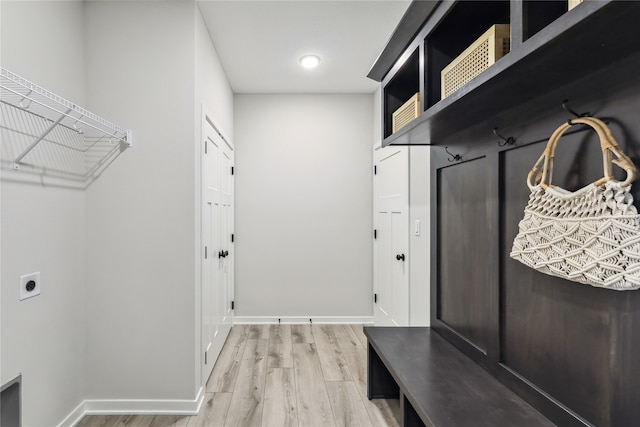 mudroom featuring wood-type flooring