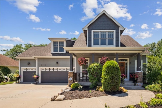 craftsman house with covered porch and a garage