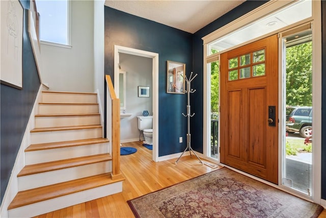 foyer with hardwood / wood-style flooring