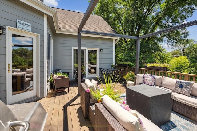 deck with an outdoor living space